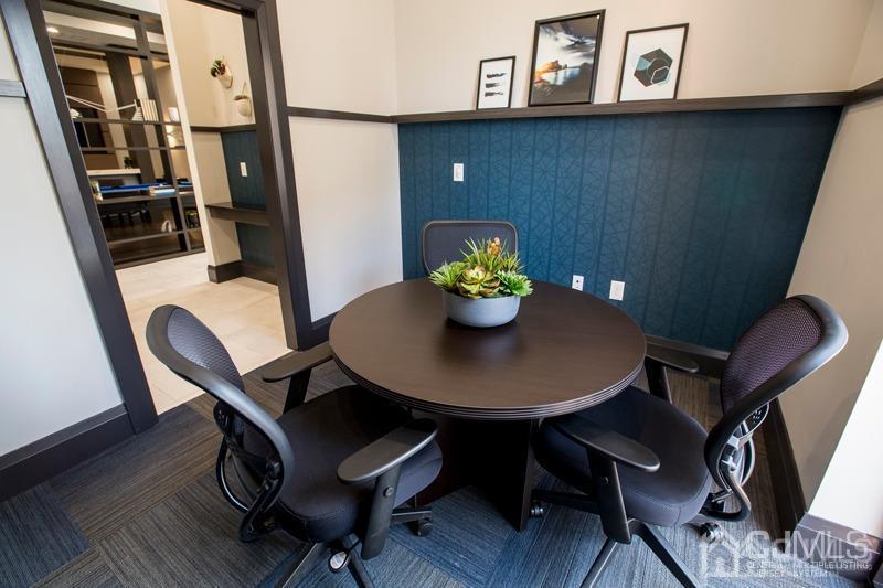 2310 Pine Valley Way Piscataway, NJ 08854 - Photo 16 of 26 a view of a dining room with furniture and wooden floor
