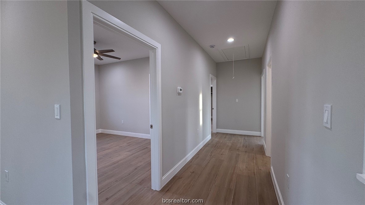 3917 Harbor Bolton Road Franklin, TX 77856 - Photo 12 of 26 a view of hallway with wooden floor
