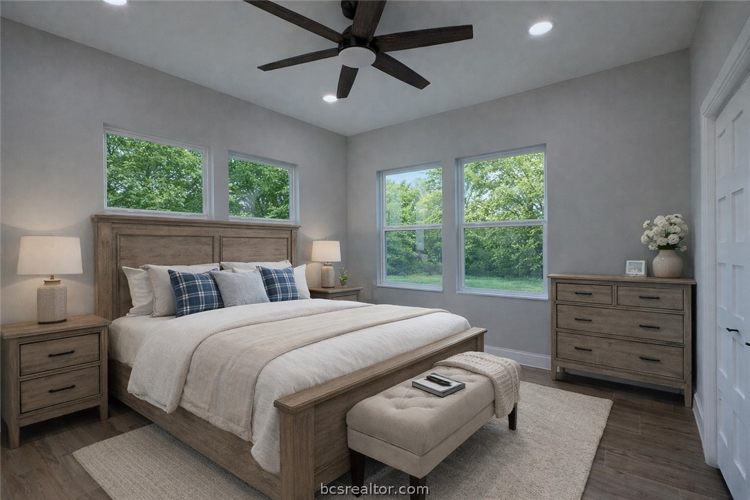 3917 Harbor Bolton Road Franklin, TX 77856 - Photo 16 of 26 a bedroom with a bed a chandelier and a window