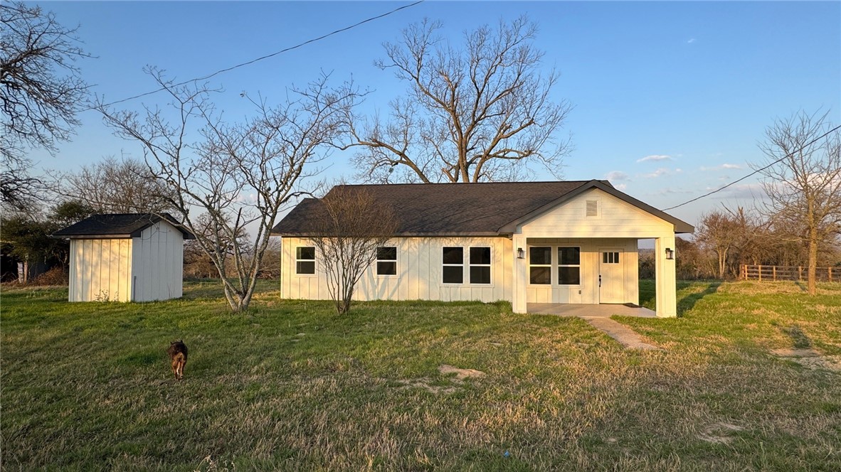 3917 Harbor Bolton Road Franklin, TX 77856 - Photo 25 of 26 a front view of a house with a yard