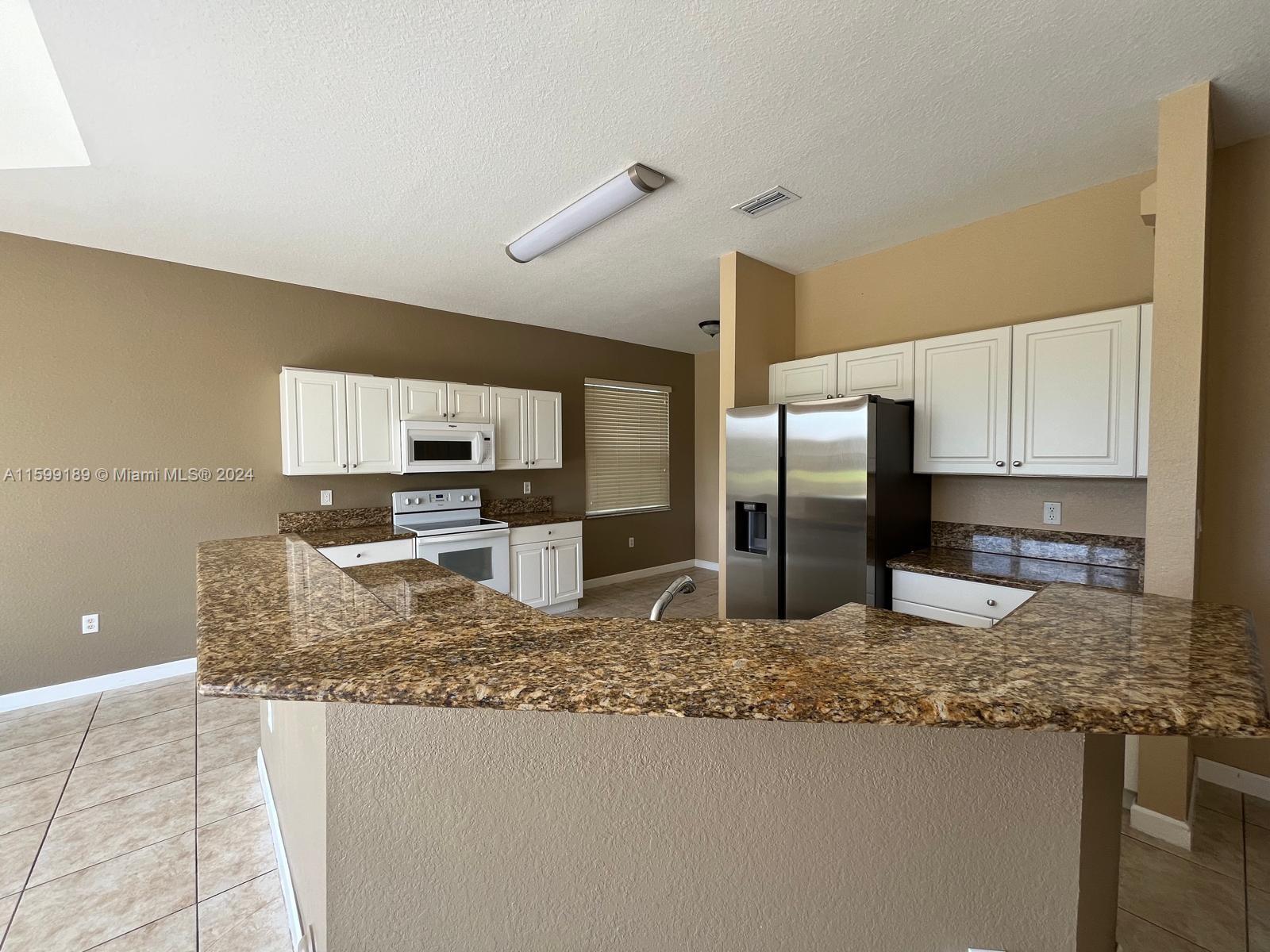 1457 Northeast 40th Road Homestead, FL 33033 - Photo 9 of 25