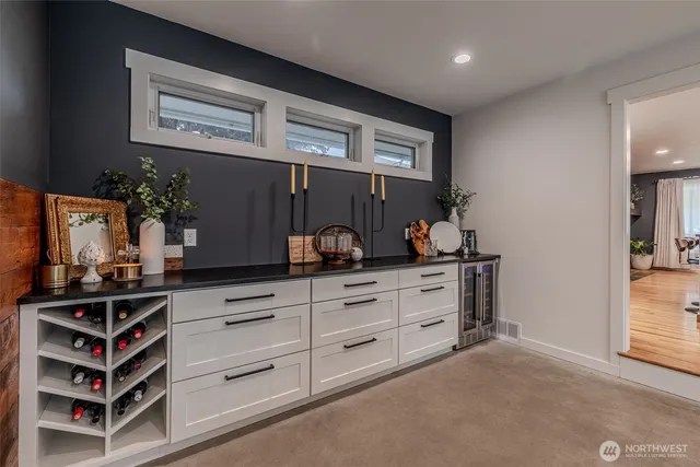 a room with cabinets and wooden floor