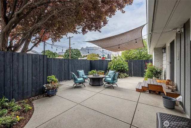 a view of backyard with seating space
