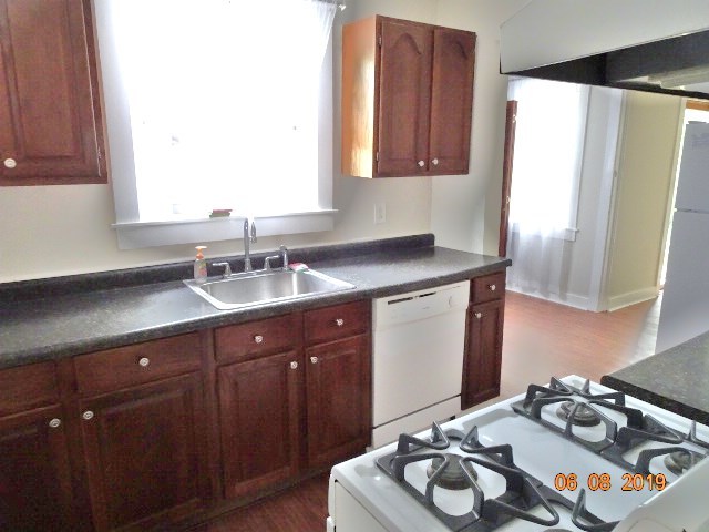 1805 Gilbert Avenue Downers Grove, IL 60515 - Photo 7 of 15 a kitchen with a sink stove and cabinets