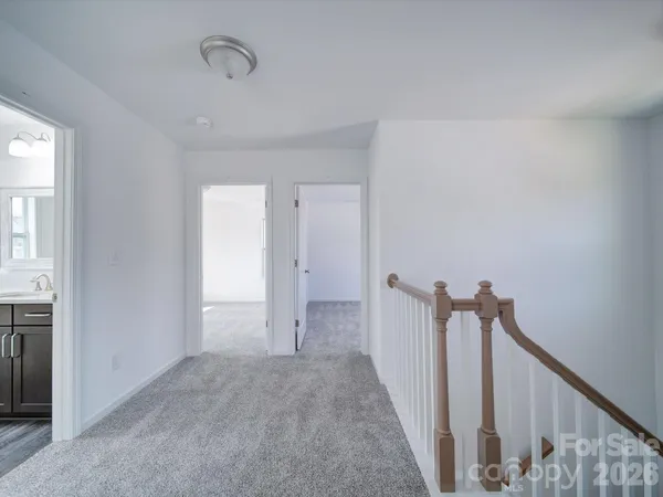 a view of hallway with stairs