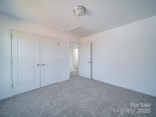 a bathroom with a sink vanity and a toilet