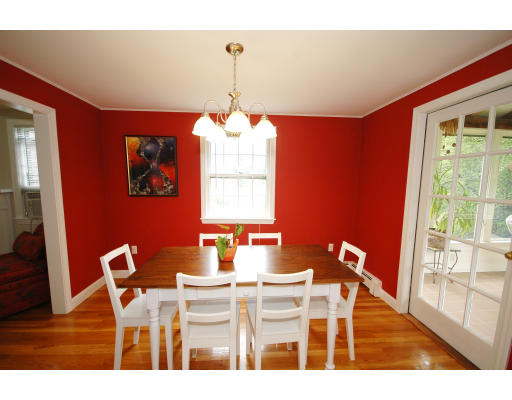 44 Chestnut Hill Road Groton, MA 01450 - Photo 13 of 23 a dining room with furniture a chandelier and wooden floor