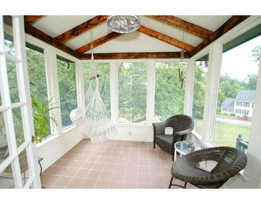 44 Chestnut Hill Road Groton, MA 01450 - Photo 14 of 23 a living room with furniture and a large window