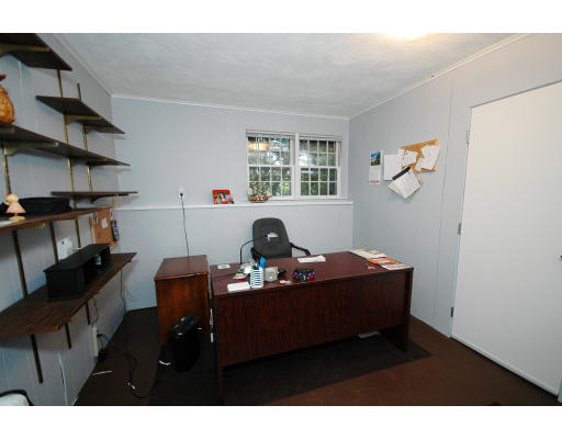 44 Chestnut Hill Road Groton, MA 01450 - Photo 22 of 23 a living room with furniture and a window