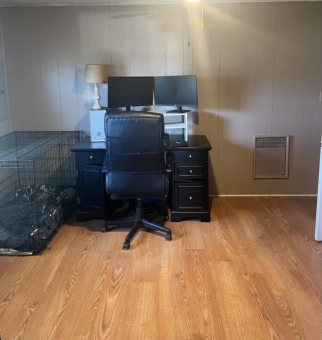 465 Hinkle Road South Sardis, TN 38371 - Photo 19 of 39 Home office featuring light wood-type flooring, heating unit, and wooden walls