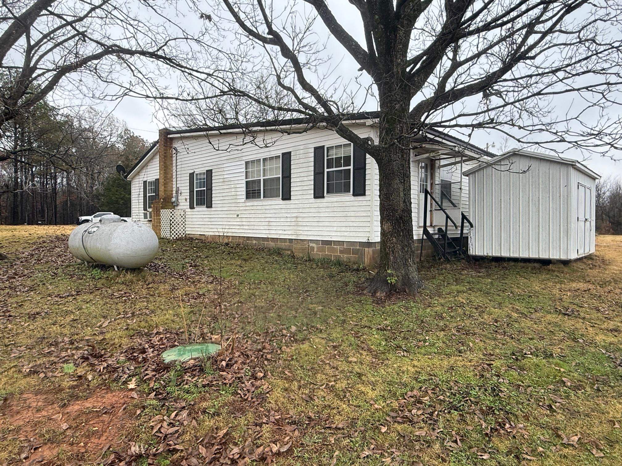 465 Hinkle Road South Sardis, TN 38371 - Photo 29 of 39 View of home's exterior with a shed