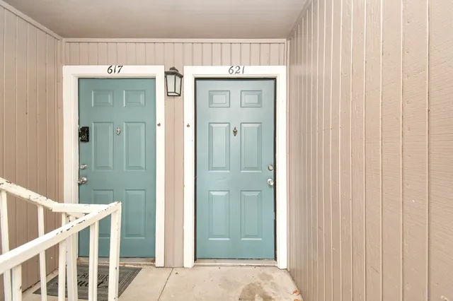 an aerial view of a house with outdoor space