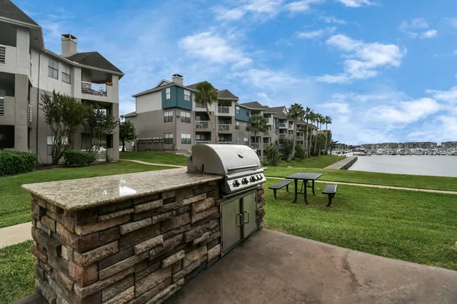 a view of a house with a yard porch and sitting area