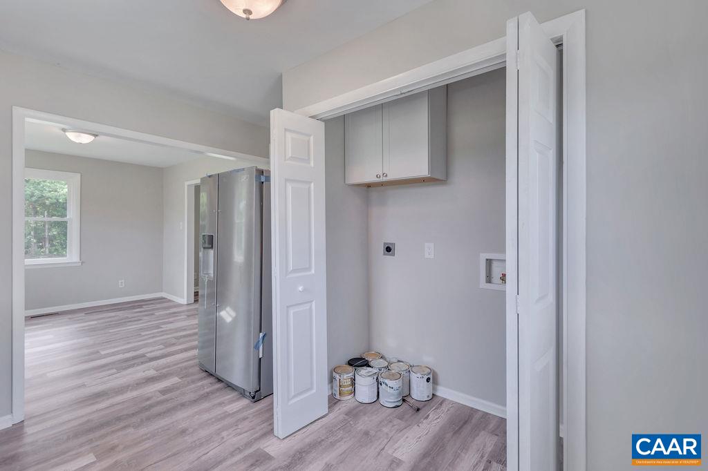 8087 Chestnut Grove Road Esmont, VA 22937 - Photo 24 of 36 a view of a room with wooden floor and closet area