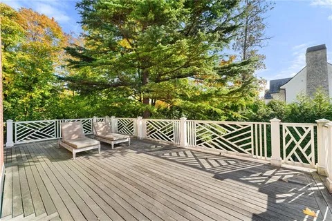 a view of a wooden floor with a bench