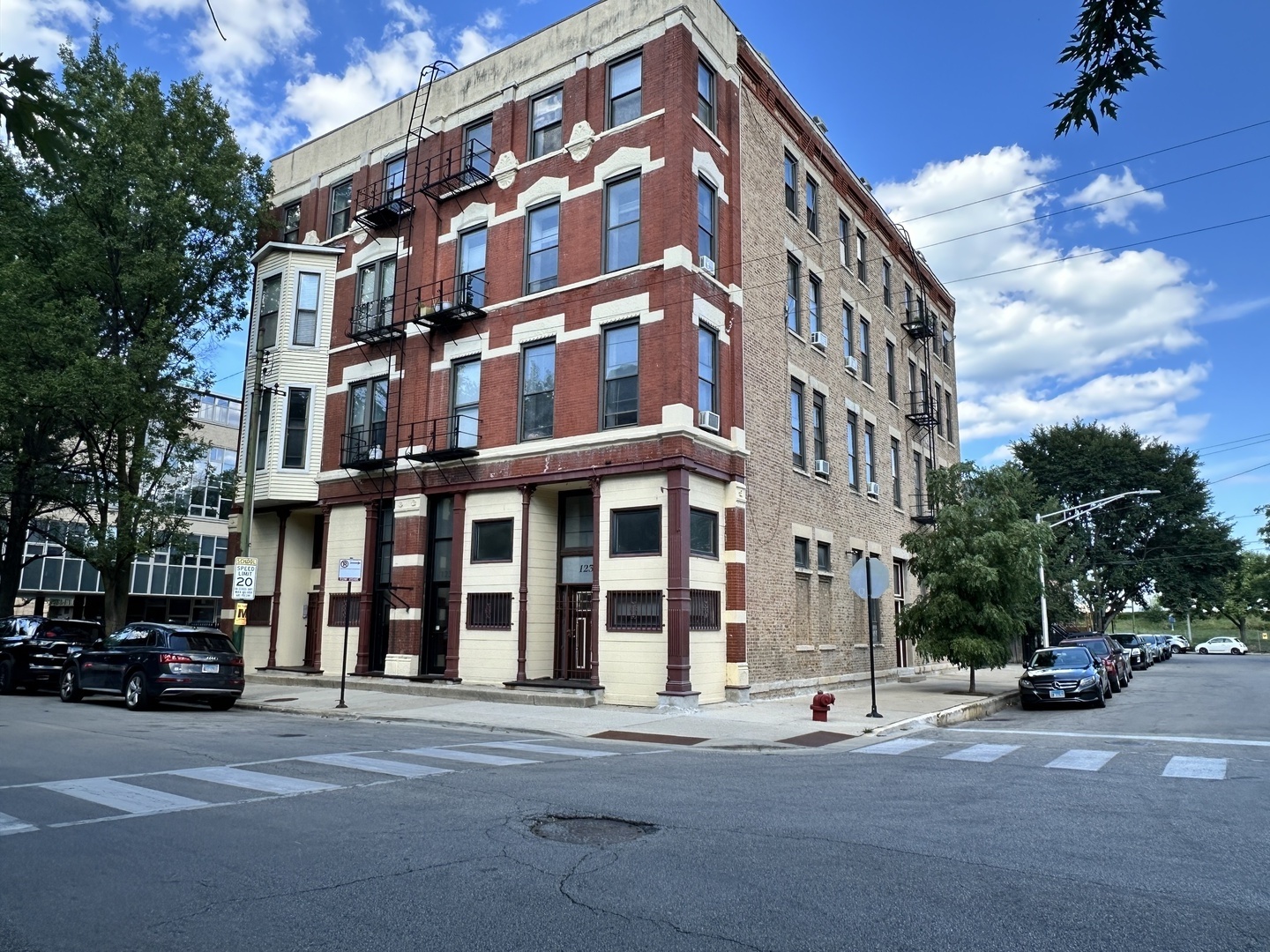 1237 North Noble Street, Unit 4 Chicago, IL 60642 - Photo 1 of 27 a view of a building and a street