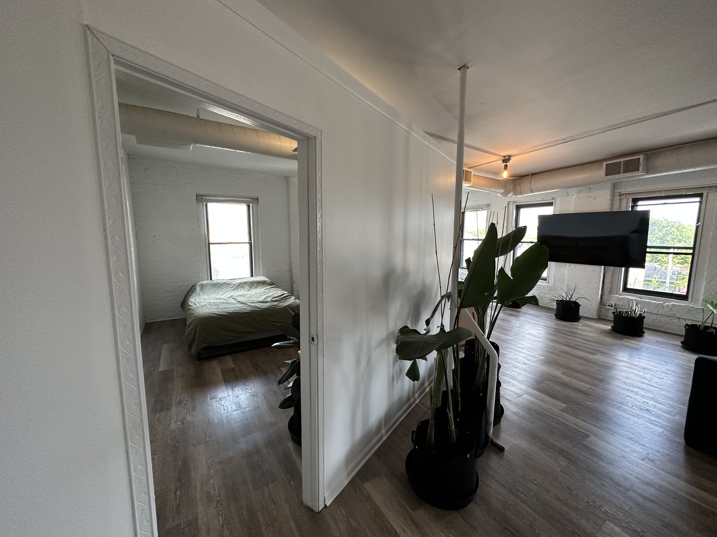 1237 North Noble Street, Unit 4 Chicago, IL 60642 - Photo 15 of 27 a living room with furniture and a wooden floor