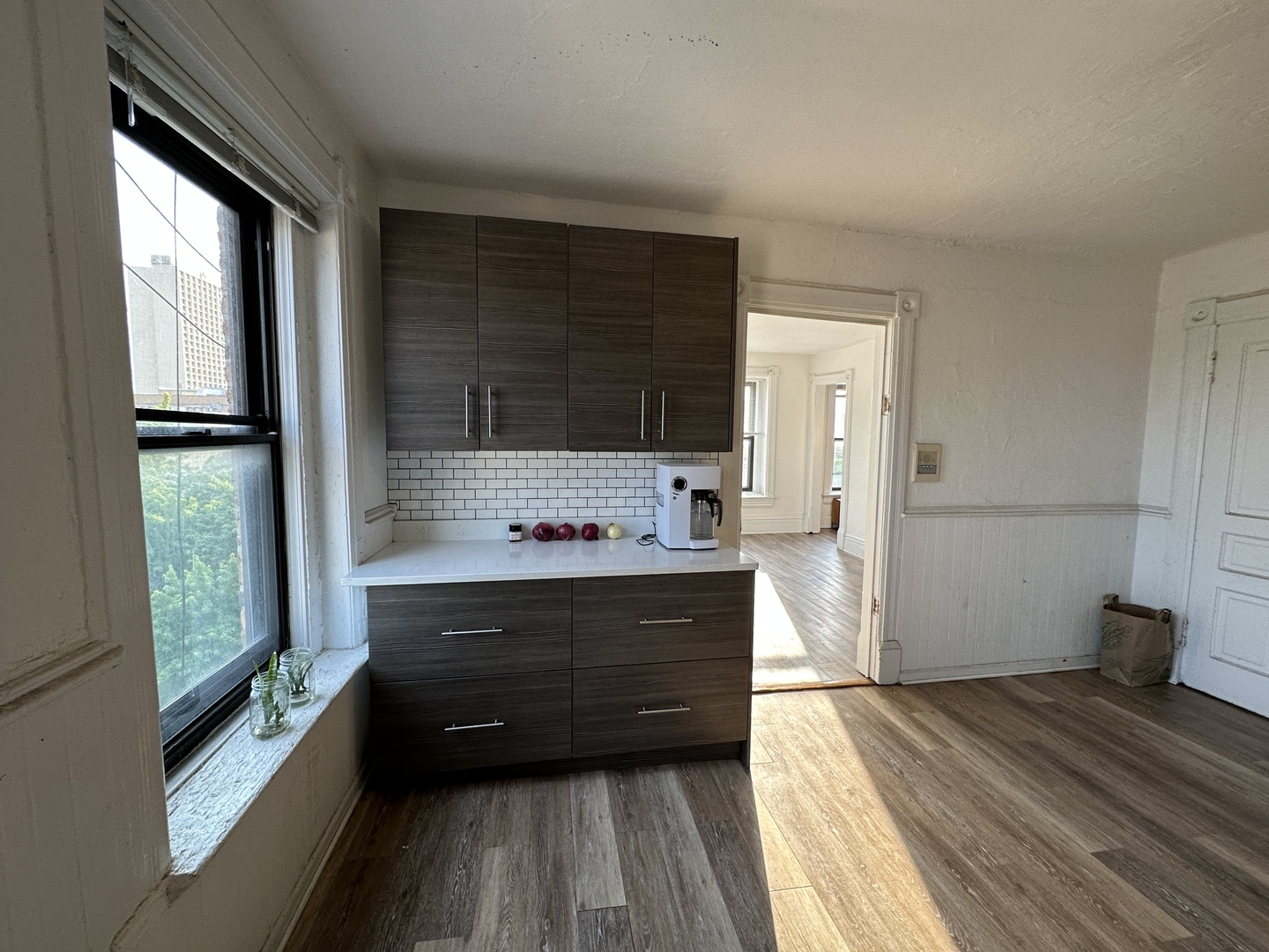 1237 North Noble Street, Unit 4 Chicago, IL 60642 - Photo 21 of 27 a bathroom with a sink a mirror and a bathtub