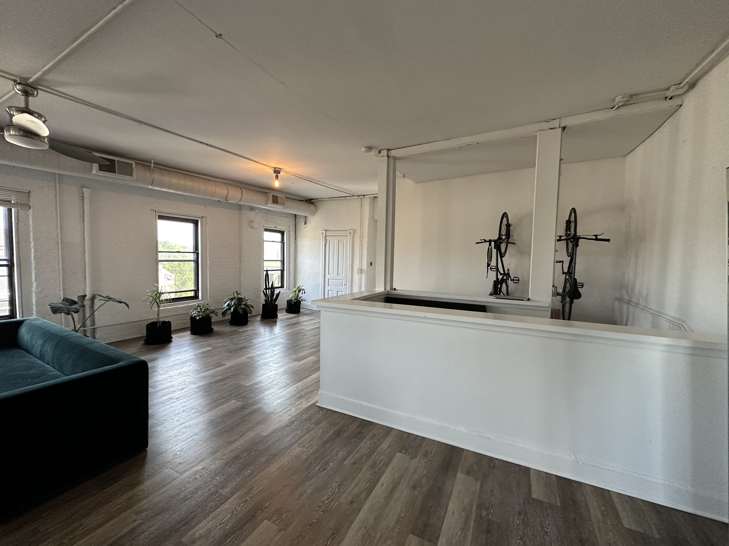 1237 North Noble Street, Unit 4 Chicago, IL 60642 - Photo 8 of 27 a living room with hardwood floor