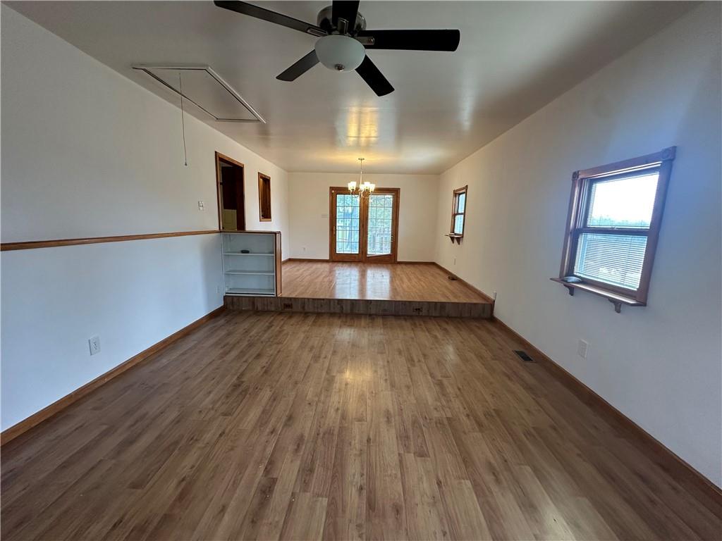 3323 Leechburg Road Lower Burrell, PA 15068 - Photo 15 of 42 wooden floor in an empty room with a window