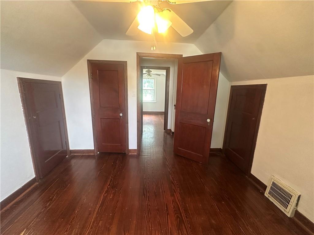 3323 Leechburg Road Lower Burrell, PA 15068 - Photo 26 of 42 a view of a hallway with wooden floor