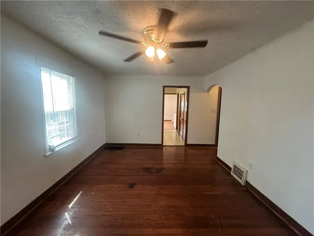 a bathroom with a sink toilet and mirror