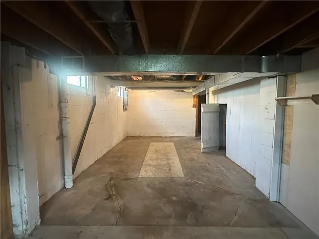 a view of a backyard with large trees