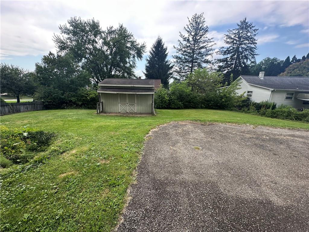 3323 Leechburg Road Lower Burrell, PA 15068 - Photo 37 of 42 a view of a backyard with large trees