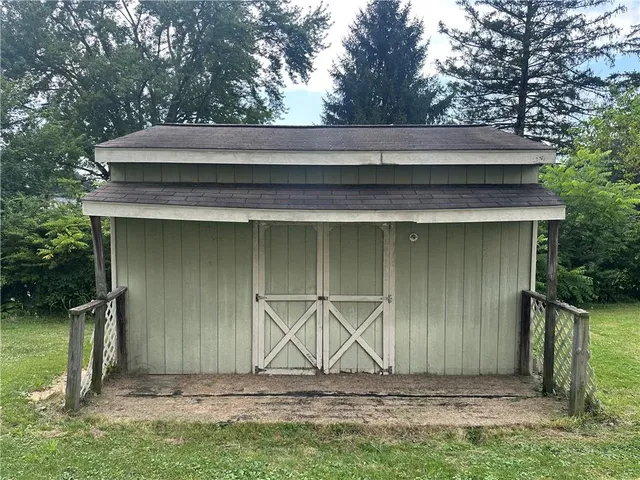 a front view of a house with a garage