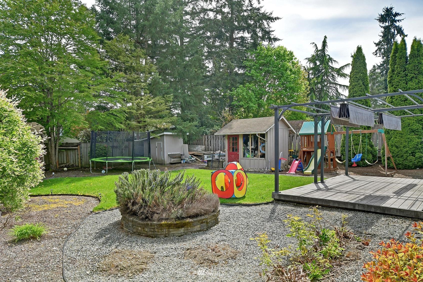 4515 Southeast 3rd Place Renton, WA 98059 - Photo 17 of 18 a front view of a house with garden
