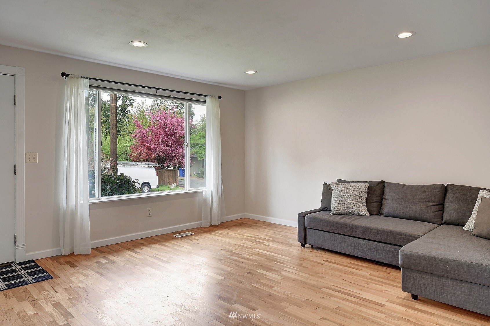 4515 Southeast 3rd Place Renton, WA 98059 - Photo 4 of 18 a living room with furniture and a large window