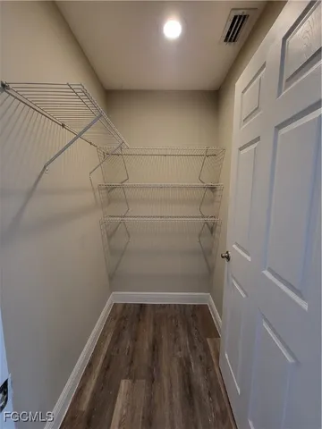 a view of a room with racks on the wall