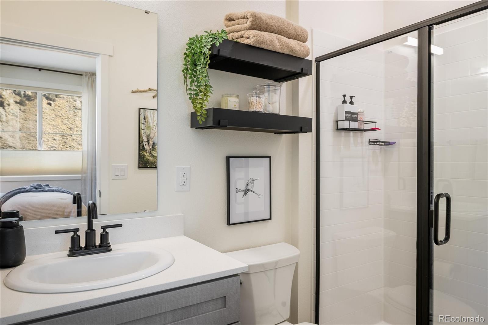 2121 Hummingbird Way, Unit 201 Georgetown, CO 80444 - Photo 11 of 29 a bathroom with a sink and a mirror