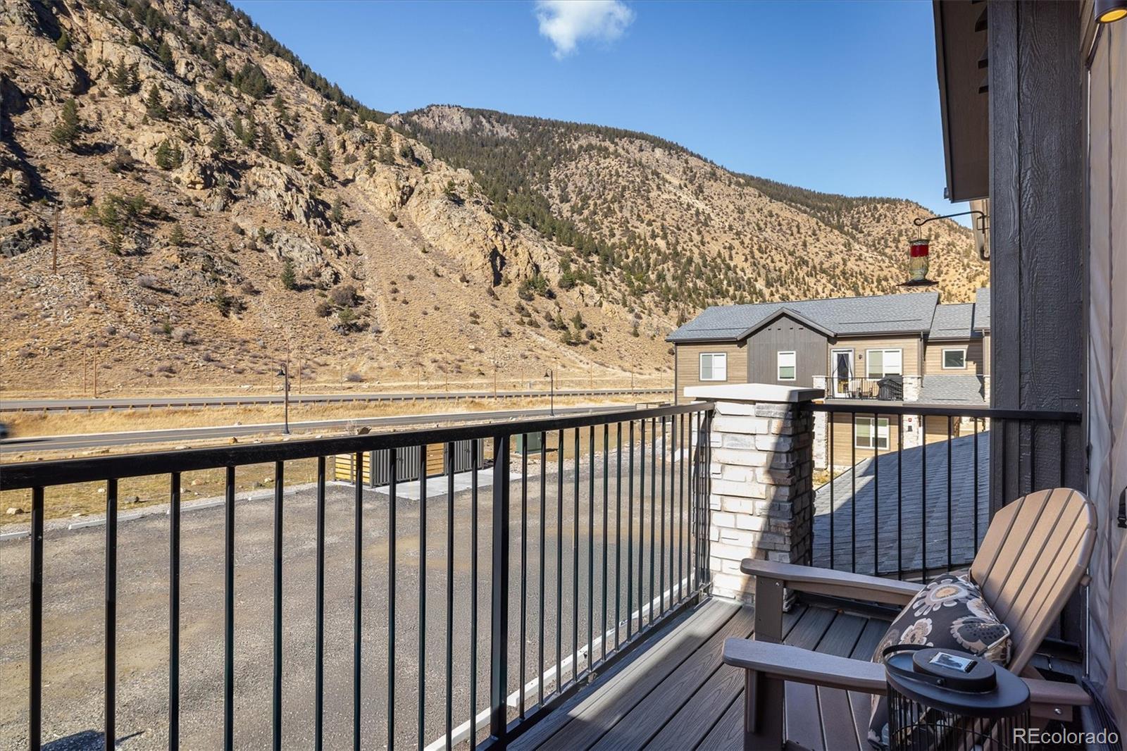 2121 Hummingbird Way, Unit 201 Georgetown, CO 80444 - Photo 16 of 29 a view of a balcony with furniture