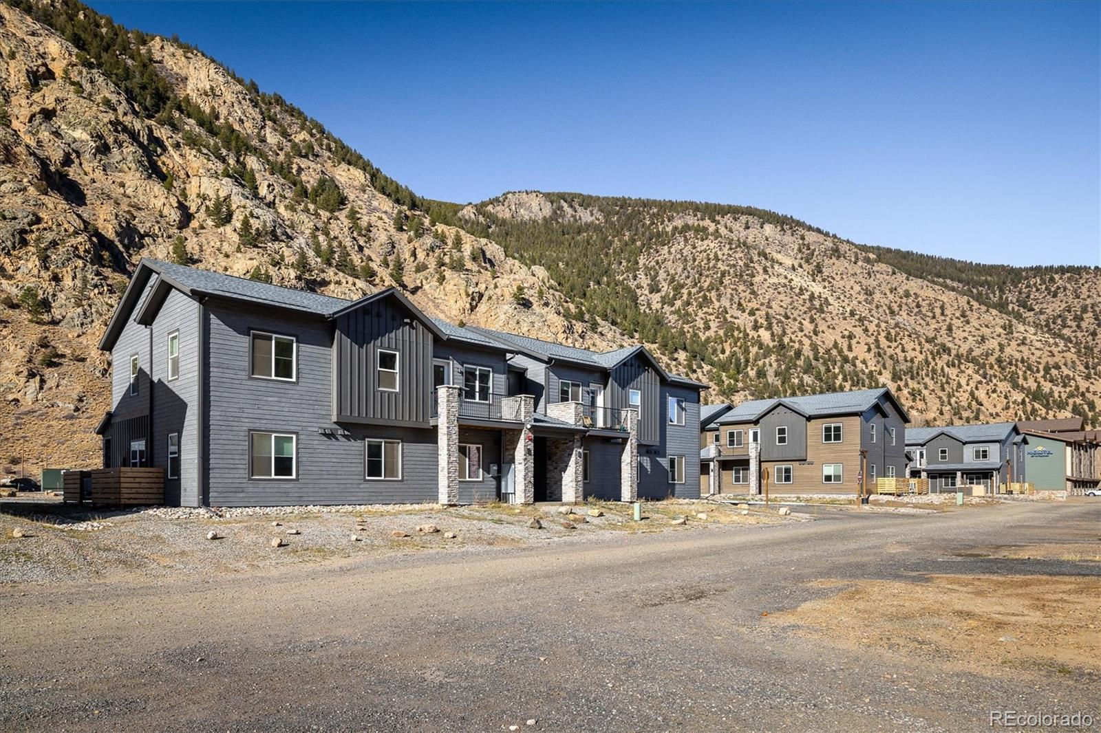 2121 Hummingbird Way, Unit 201 Georgetown, CO 80444 - Photo 21 of 29 a view of a building with a street