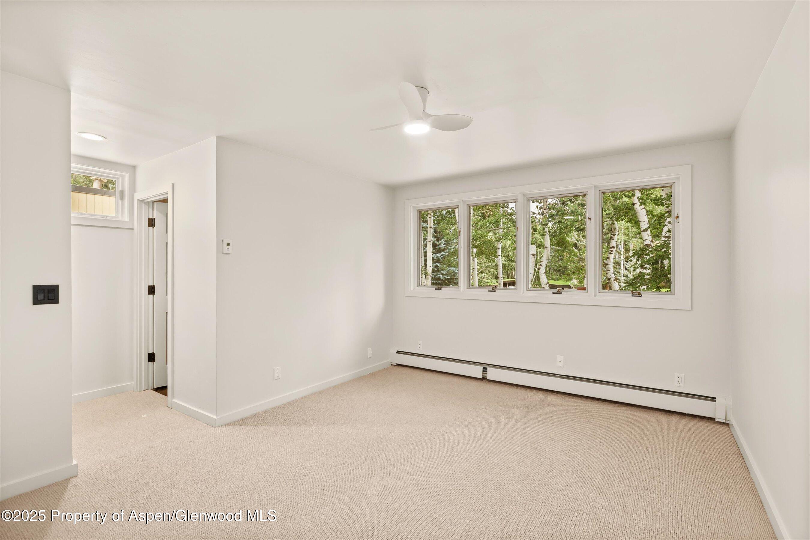 1443 Crystal Lake Road, Unit 3E Aspen, CO 81611 - Photo 20 of 34 an empty room with windows