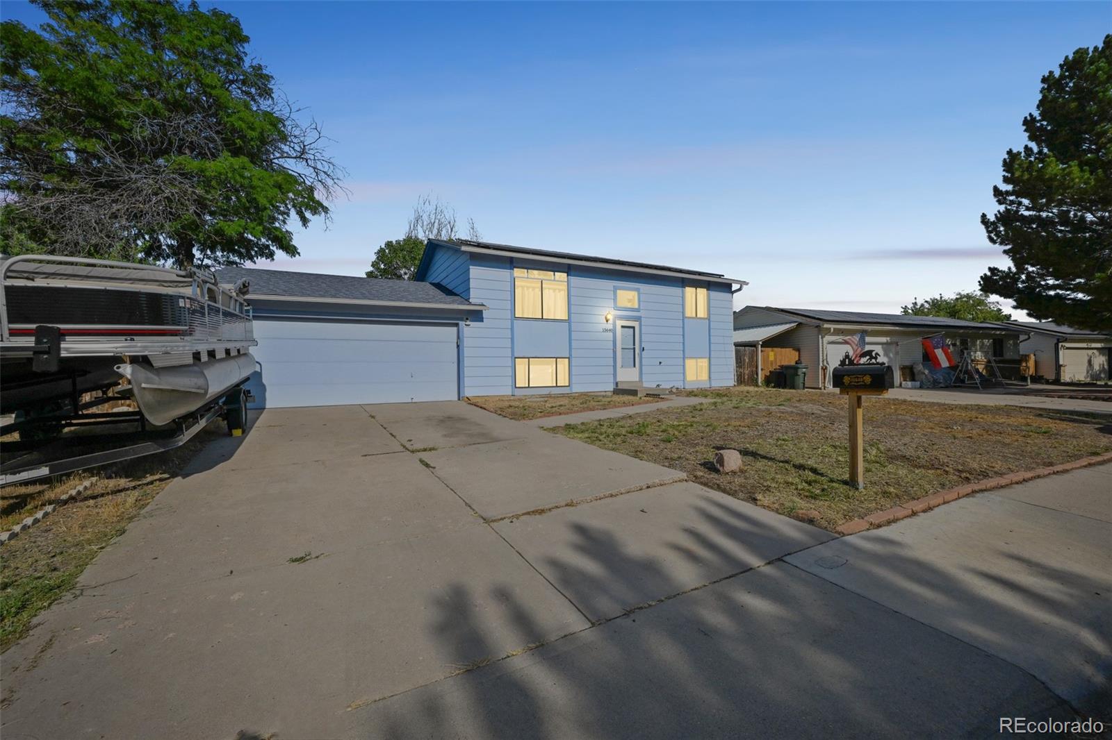 15640 East Eldorado Drive Aurora, CO 80013 - Photo 2 of 33 a view of a house with a street