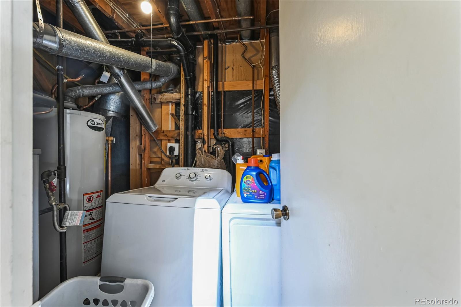 15640 East Eldorado Drive Aurora, CO 80013 - Photo 27 of 33 a utility room with dryer and washer