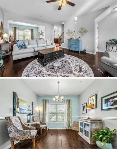 a living room with furniture and a chandelier