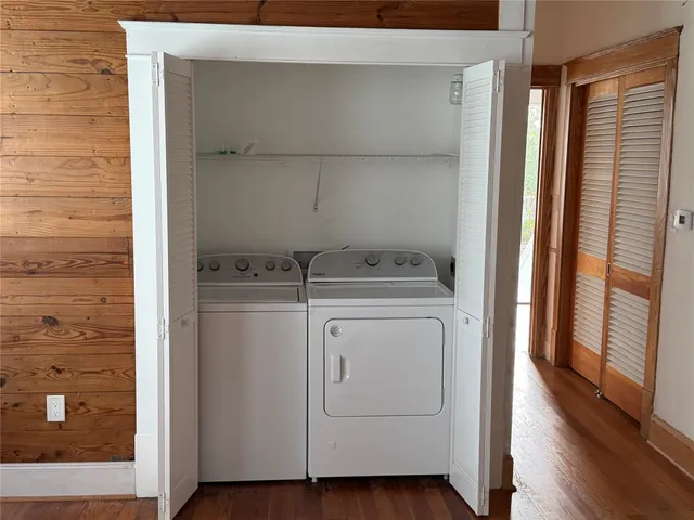 a utility room with dryer and washer