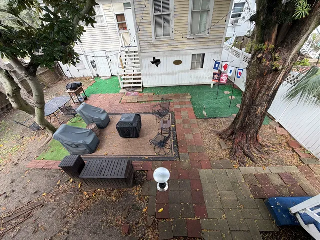 a view of yard with an outdoor seating