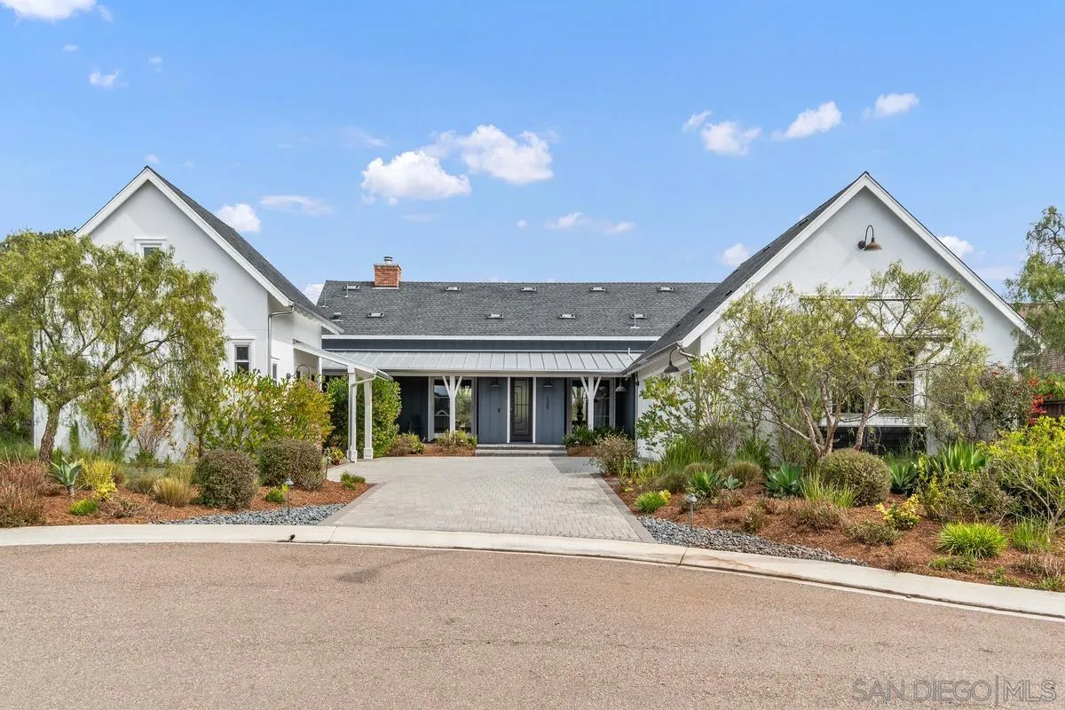 a view of a house with a street