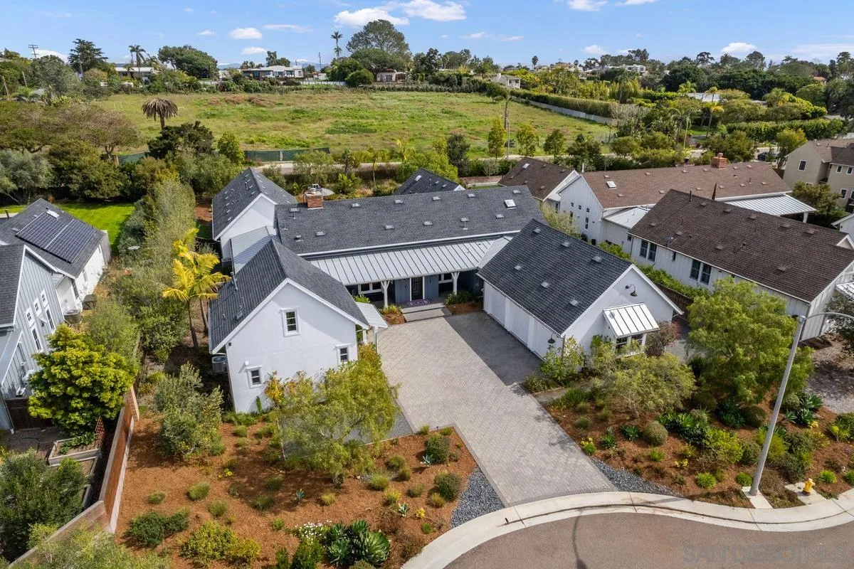 1249 Canton Court Encinitas, CA 92007 - Photo 2 of 4 an aerial view of a house with a lake view