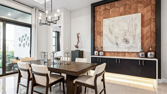 a view of a dining room with furniture and window