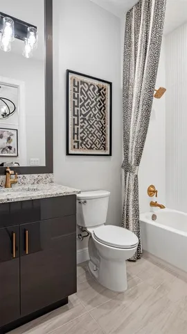 a bathroom with a sink a toilet and a bathtub