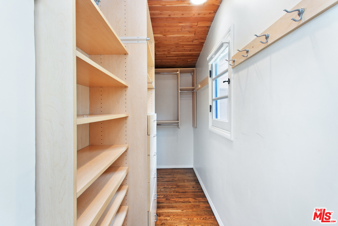 3937 Roderick Road Los Angeles, CA 90065 - Photo 17 of 28 a view of a hallway with wooden floor and staircase