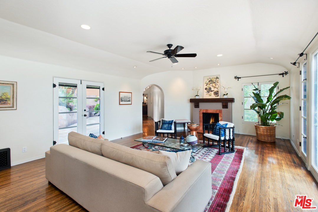3937 Roderick Road Los Angeles, CA 90065 - Photo 6 of 28 a living room with furniture fireplace and wooden floor