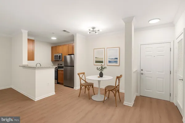 a view of kitchen with wooden floor