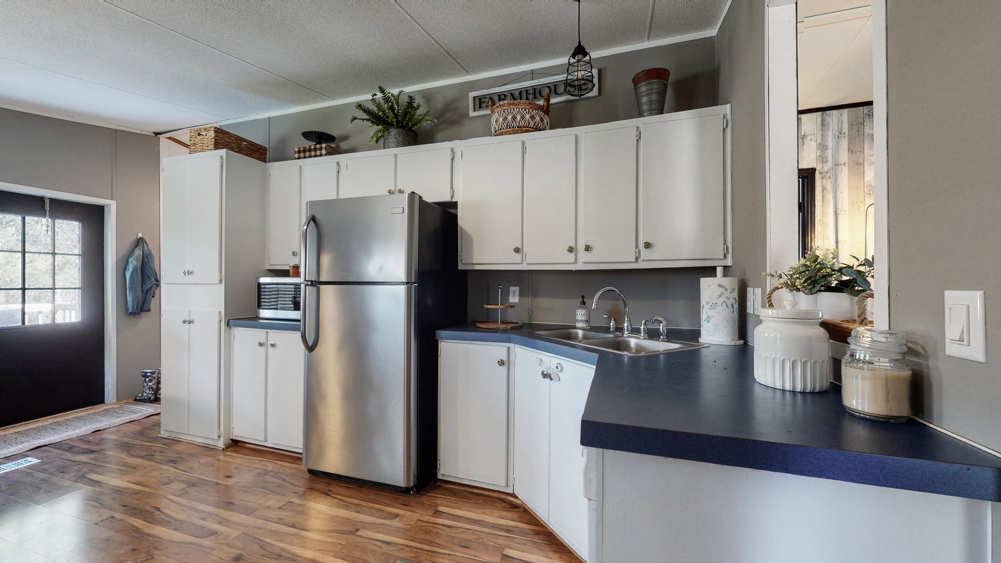 4010 A Trinity Road Franklin, TN 37067 - Photo 10 of 28 a kitchen with stainless steel appliances a refrigerator a sink a stove and cabinets