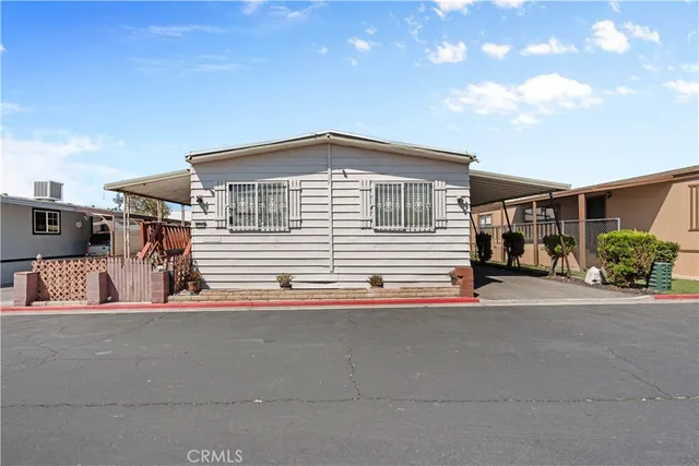 a front view of a house with a garage